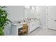 Main bathroom with double vanity and a separate makeup vanity at 2020 Bixby Se St, Atlanta, GA 30317