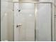 This glass-enclosed shower features stylish white tile and modern fixtures at 2020 Bixby Se St, Atlanta, GA 30317