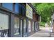 Dogs To Die For storefront with painted windows and black awning at 2020 Bixby Se St, Atlanta, GA 30317