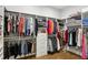 Spacious walk-in closet with custom shelving and drawers for ample storage at 2020 Bixby Se St, Atlanta, GA 30317