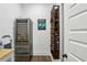 Walk-in wine cellar with racks and cooler at 2020 Bixby Se St, Atlanta, GA 30317