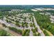 Lawrenceville community with a mix of townhomes, mature trees, and lush greenery, offering scenic views at 2331 Suwanee Pointe Dr, Lawrenceville, GA 30043