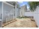 Backyard patio with outdoor seating and landscaping at 2331 Suwanee Pointe Dr, Lawrenceville, GA 30043