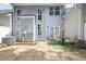 Backyard patio with furniture and privacy fence at 2331 Suwanee Pointe Dr, Lawrenceville, GA 30043