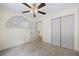 Cozy bedroom features a large window and ample closet space at 2331 Suwanee Pointe Dr, Lawrenceville, GA 30043