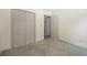 Bedroom with large closet, neutral walls and carpet at 2331 Suwanee Pointe Dr, Lawrenceville, GA 30043