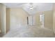 Spacious bedroom featuring neutral walls and carpet and high ceiling at 2331 Suwanee Pointe Dr, Lawrenceville, GA 30043