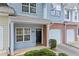 Exterior view of the home with an attached garage and well-manicured bushes at 2331 Suwanee Pointe Dr, Lawrenceville, GA 30043