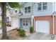 Street view showcasing the home with an attached garage and a walkway at 2331 Suwanee Pointe Dr, Lawrenceville, GA 30043