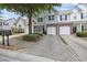 Charming townhome featuring a single-car garage, neat landscaping, and a welcoming entrance at 2331 Suwanee Pointe Dr, Lawrenceville, GA 30043