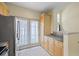 Bright eat-in kitchen featuring stainless steel appliances and a glass patio door at 2331 Suwanee Pointe Dr, Lawrenceville, GA 30043