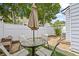 Private patio with outdoor seating, perfect for relaxing or entertaining at 2331 Suwanee Pointe Dr, Lawrenceville, GA 30043