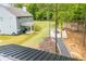 Aerial view of backyard with a firepit seating area at 445 Boulder Crest Trl, Villa Rica, GA 30180