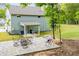 Outdoor seating area with lush backyard space at 445 Boulder Crest Trl, Villa Rica, GA 30180