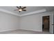 Spacious bedroom with neutral walls and a modern ceiling fan, ready for personalization at 445 Boulder Crest Trl, Villa Rica, GA 30180