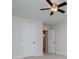 Clean bedroom with ceiling fan and access to an en suite bathroom at 445 Boulder Crest Trl, Villa Rica, GA 30180