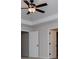 Well-lit bedroom showcasing access to bathroom, highlighting the convenience of an en-suite layout at 445 Boulder Crest Trl, Villa Rica, GA 30180