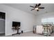 Bedroom with soft carpet, window, ceiling fan and television at 445 Boulder Crest Trl, Villa Rica, GA 30180