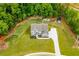 Beautifully landscaped home with a large yard and inviting curb appeal at 445 Boulder Crest Trl, Villa Rica, GA 30180