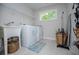 Functional laundry room with ample storage, sink, and natural light at 445 Boulder Crest Trl, Villa Rica, GA 30180