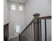 View of the home's staircase with natural light at 445 Boulder Crest Trl, Villa Rica, GA 30180