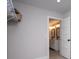 A walk-in closet leading to a double vanity bathroom with neutral gray walls at 445 Boulder Crest Trl, Villa Rica, GA 30180