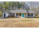 Beautiful single-story home featuring a blue door and siding at 447 Wallace Way, Rockmart, GA 30153