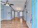 Light-filled living room with wood flooring and a view through to other areas at 447 Wallace Way, Rockmart, GA 30153