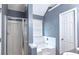Bathroom features a shower, bath, large mirror, and a window allowing for natural light at 3479 Lake Forge Dr, Fairburn, GA 30213