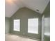 Bedroom with vaulted ceilings and neutral paint at 3479 Lake Forge Dr, Fairburn, GA 30213