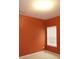 A cozy bedroom featuring vibrant walls and a window, offering a comfortable retreat at 3479 Lake Forge Dr, Fairburn, GA 30213