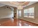 Bright living room featuring a stone fireplace and large windows at 604 Lexington Way, Woodstock, GA 30189