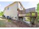 A fenced-in wooden deck with steps, offering privacy and outdoor living space at 902 Preserve Bluff Dr, Buford, GA 30518