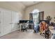 Bedroom with a workstation and vaulted ceilings, perfect for work and relaxation at 902 Preserve Bluff Dr, Buford, GA 30518