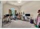 Large bedroom with multiple computer setups, ideal for gaming or working from home at 902 Preserve Bluff Dr, Buford, GA 30518