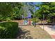 A community playground featuring colorful equipment, benches, and a grassy area at 902 Preserve Bluff Dr, Buford, GA 30518