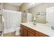 Well-maintained bathroom featuring a vanity with modern fixtures and a shower-tub combination at 1055 Chelsey Way, Roswell, GA 30075