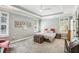Serene bedroom with tray ceilings, plantation shutters, and a comfortable queen-sized bed at 1055 Chelsey Way, Roswell, GA 30075