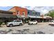 Inviting street view with diverse storefronts, pedestrian activity, and cars parked along the curb at 1055 Chelsey Way, Roswell, GA 30075