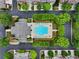 Aerial view of the community pool, showing its central location and landscaping at 11187 Calypso Dr # 12, Alpharetta, GA 30009