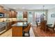 Well-appointed kitchen featuring granite countertops, stainless steel appliances, and ample cabinetry at 11187 Calypso Dr # 12, Alpharetta, GA 30009