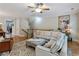 Comfortable living room featuring a spacious sectional sofa and stylish decor at 11187 Calypso Dr # 12, Alpharetta, GA 30009
