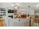 Spacious living room with fireplace, built-in shelving, and open floor plan at 11187 Calypso Dr # 12, Alpharetta, GA 30009