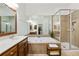 Luxurious main bathroom with dual sinks, a soaking tub, and a separate glass-enclosed shower at 11187 Calypso Dr # 12, Alpharetta, GA 30009
