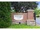 A brick sign for Westwood Park neighborhood with well-maintained landscaping at 11187 Calypso Dr # 12, Alpharetta, GA 30009