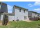A lovely backyard featuring a small patio and a well maintained lawn area at 118 Woodhouse Cir, Acworth, GA 30102