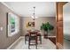 Charming breakfast nook with a round table, bar stools, and a view of the outdoors at 331 Lakemoore Ne Dr # C, Atlanta, GA 30342