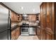 Well-appointed kitchen with stainless steel appliances and dark granite countertops at 331 Lakemoore Ne Dr # C, Atlanta, GA 30342