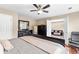 Bedroom featuring a king-sized bed with an adjacent sitting room at 100 Lantana Dr, Locust Grove, GA 30248