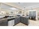 Functional kitchen featuring stainless steel appliances, laminate countertops, and an open view to the dining area at 100 Lantana Dr, Locust Grove, GA 30248